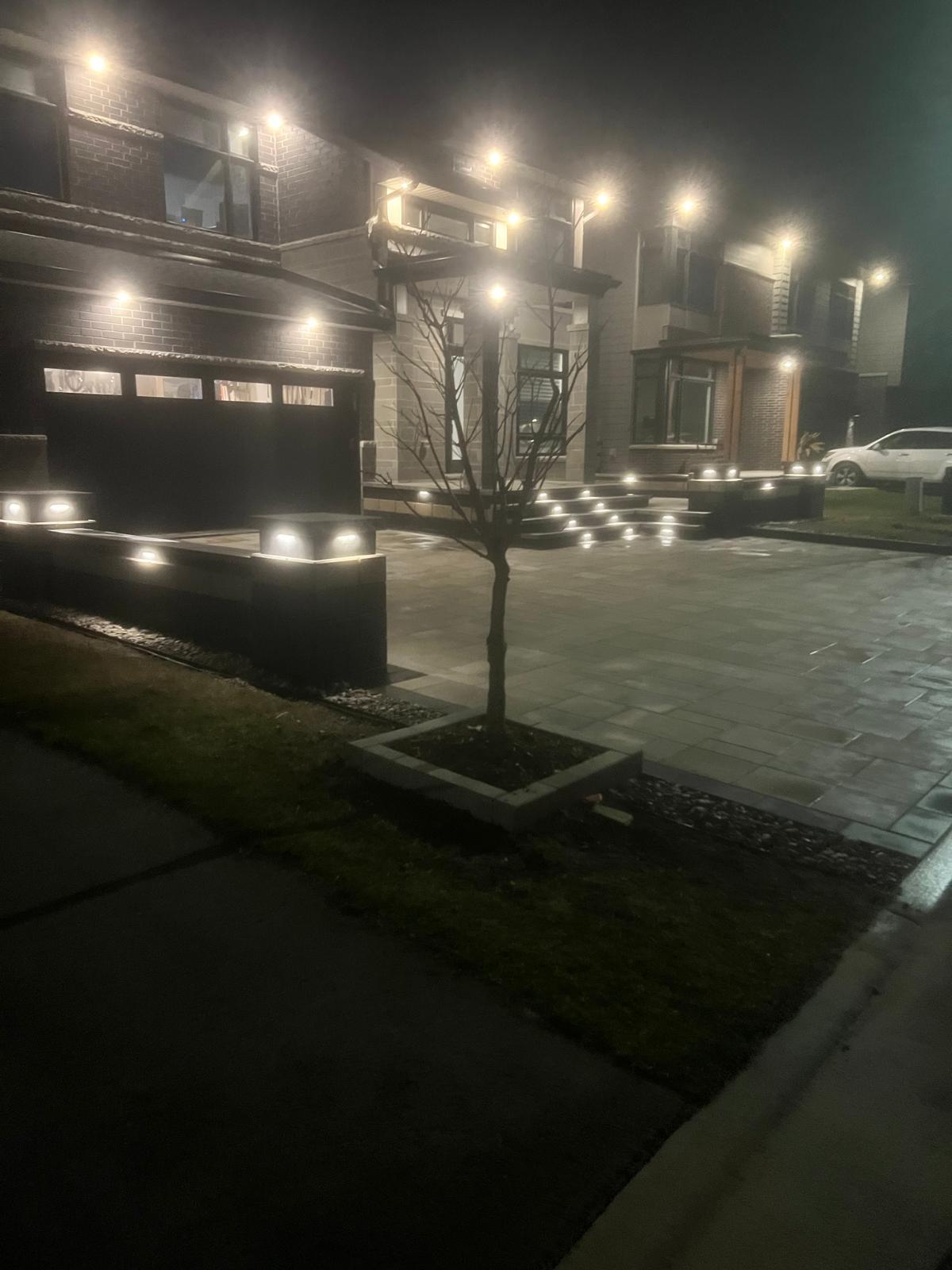 Night-lit Front Drive — Driveway